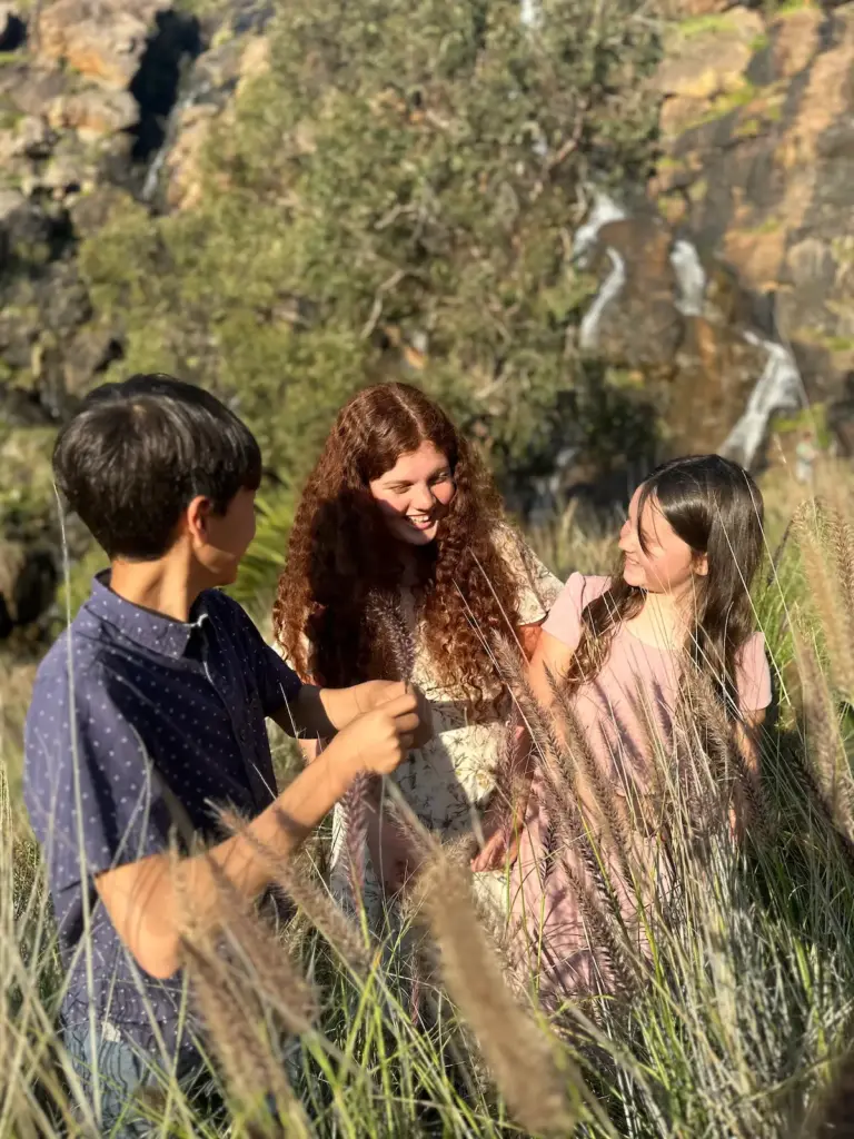 Young people outdoors among the trees
